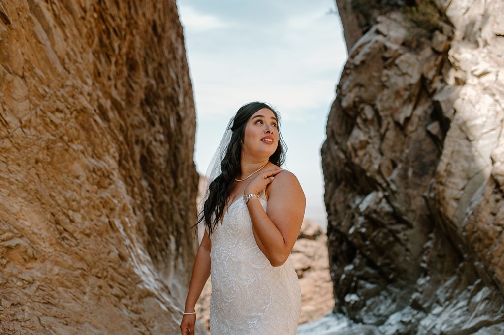 Bride between rock walls
