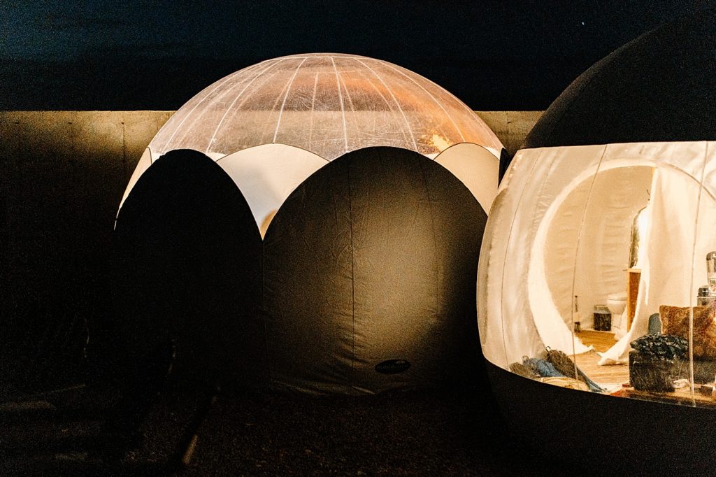 Detail shot of bubble tents with lights inside