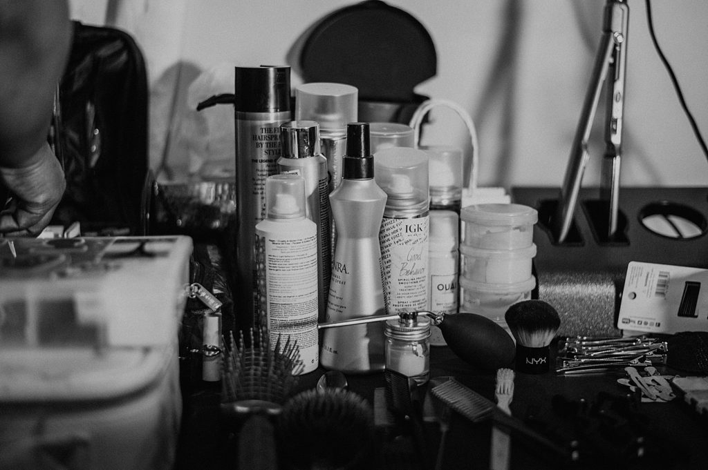 B&W of makeup artist station getting ready