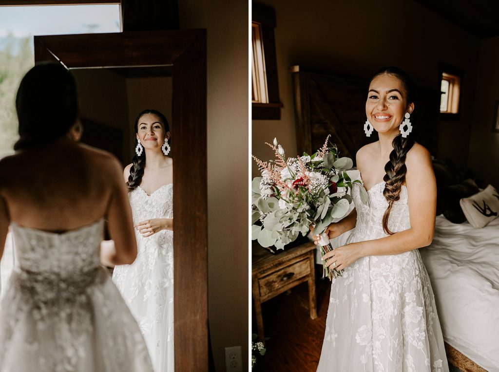 Bride after getting ready looking in the mirror with white bouquet