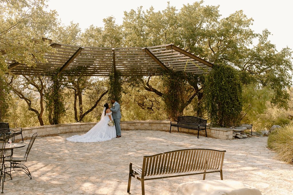 Bride and Groom in stone pavement courtyard