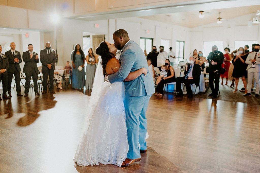Bride and Groom kissing during first dance
