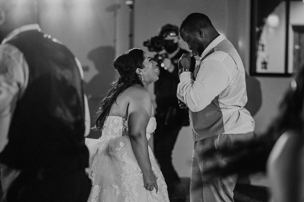 B&W Bride and Groom dancing at the Reception