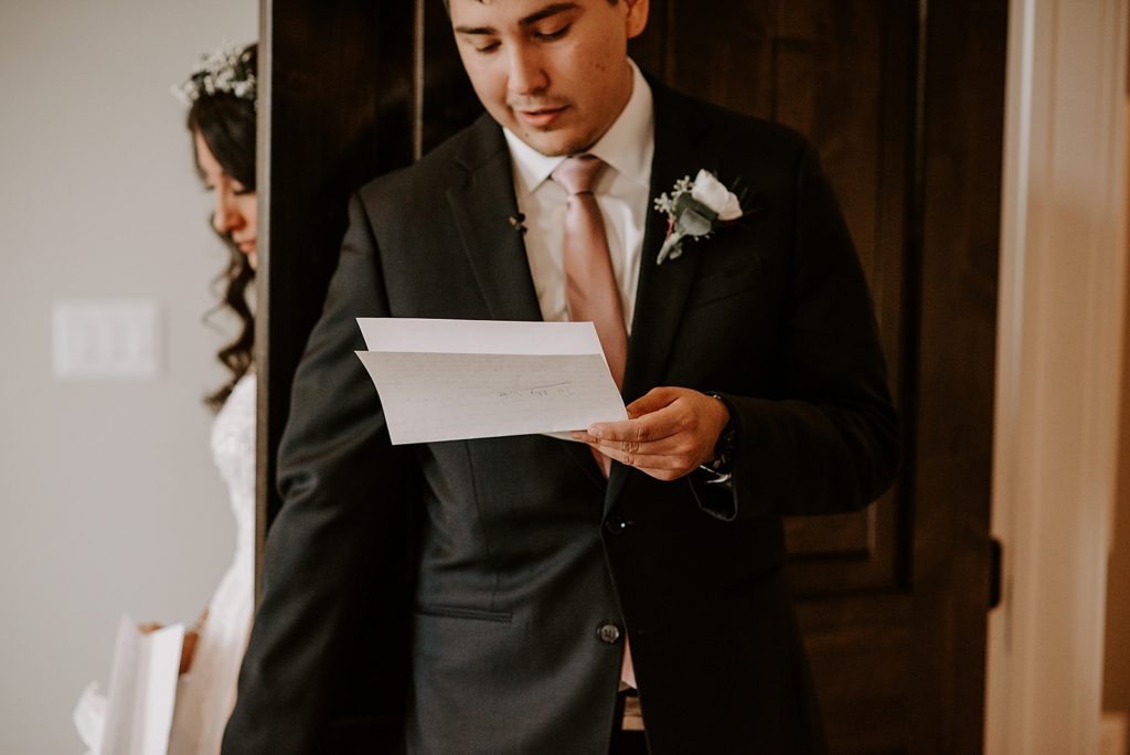 Groom reading letter before Ceremony to Bride