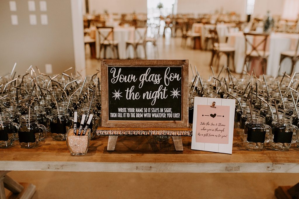 Table of Mason jar cups for the Reception