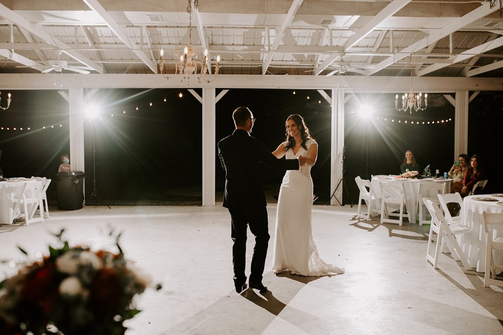 Bride and Groom dancing during nighttime Reception