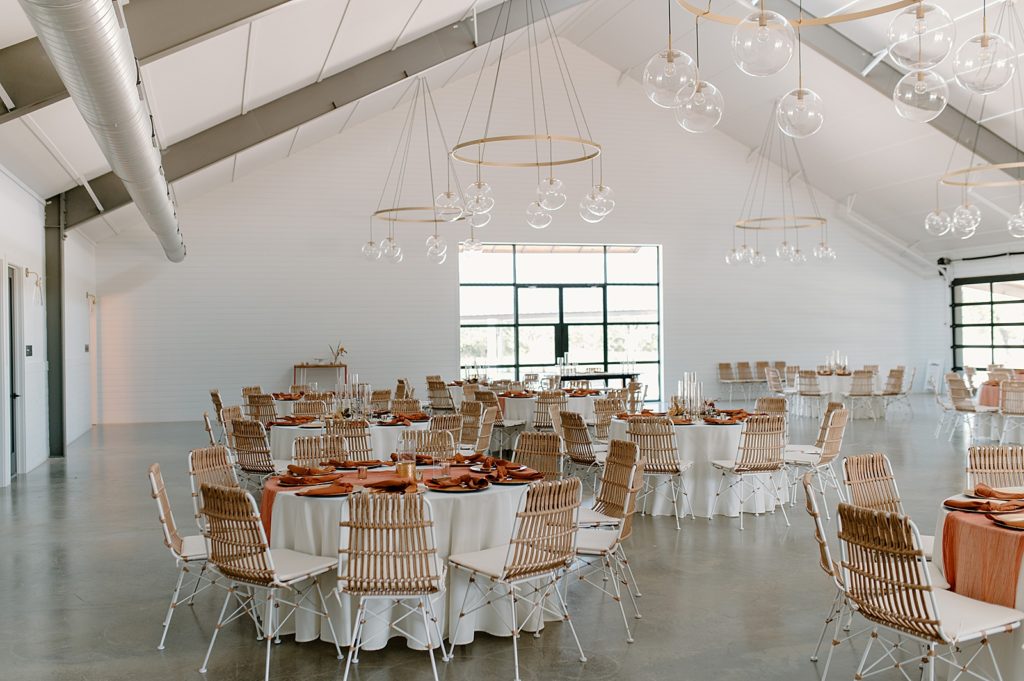 Reception Tables set uo with round glass chandeliers 